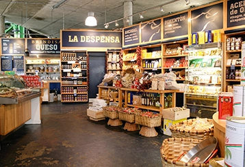 Creative stall designs showcasing food and beverage brands at trade shows and exhibitions.