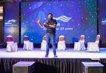 Team managing venue setup and logistics for seamless corporate anniversary celebrations in Coimbatore.