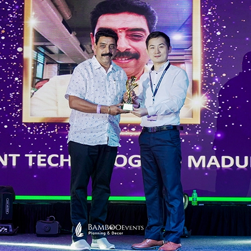 Top corporate honors event boasting premium trophies, brilliant ambient stage lights, and red carpets.