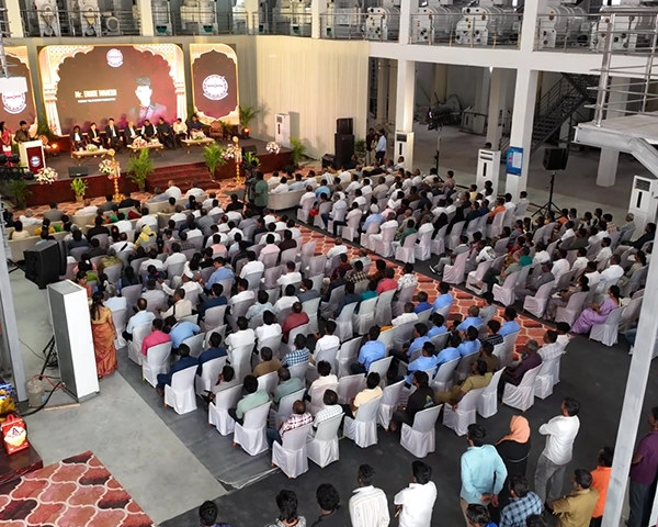 Modern corporate event management team executing a high-profile business conference in Coimbatore.