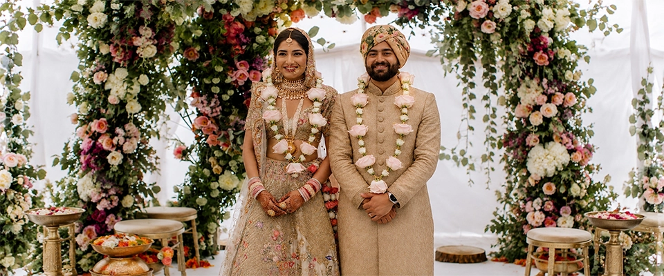 Fusion intercaste marriage celebration combining traditions with elegant wedding event arrangements