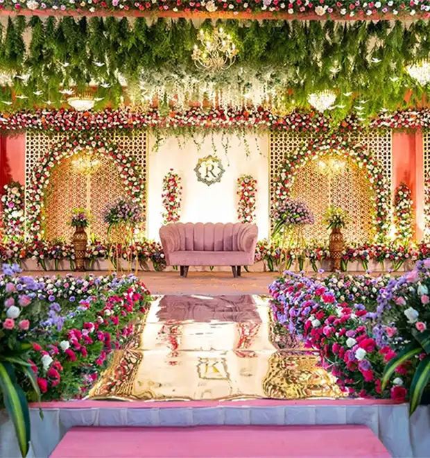 Grand wedding celebration with elegant stage decor and arrangements for wedding events in Erode