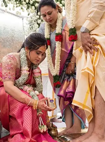 Hindu wedding ceremony in Mettupalayam featuring traditional rituals, wedding decorations and family participation.