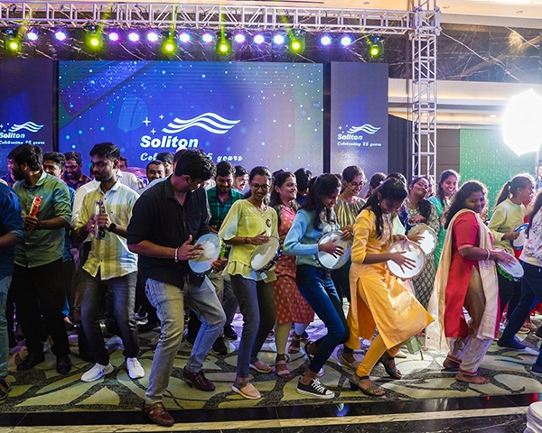 Expert event coordinators managing backstage production for a large-scale international business forum.