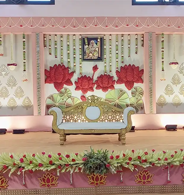 Traditional wedding function with ceremonial decor and arrangements for families in Erode