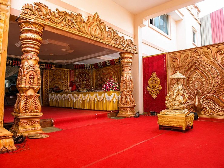 Well-designed outdoor wedding venue setup with seating, décor and traditional ceremonial arrangements.